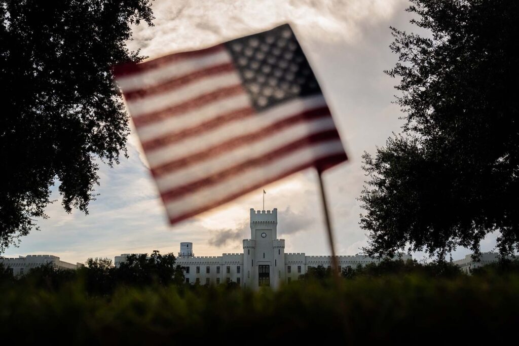 American flag with a view of The Citadel