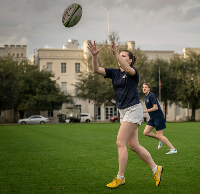 Female playing rugby